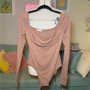 FP Movement by Free People Dusty Pink Bodysuit